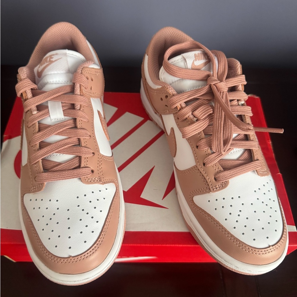 Women’s Nike Dunk Low White and Pink Sneakers